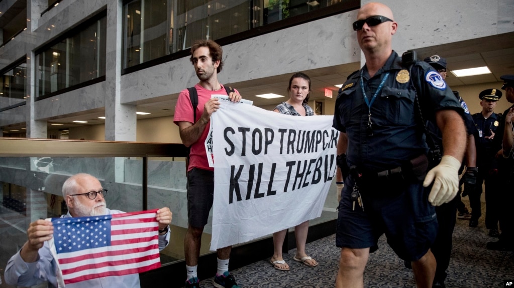 More Hurdles to Passing Senate Republican Health Care Bill Capitol Hill police officers move in on a group protesting the Republican health care bill outside the offices of Sen. Dean Heller, R-Nev., on Capitol Hill in Washington, July 17, 2017.