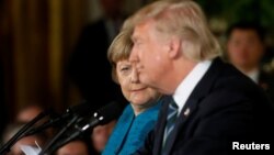 Thủ tướng Đức và Tổng thống Mỹ trong cuộc họp báo chung hôm 17/3.