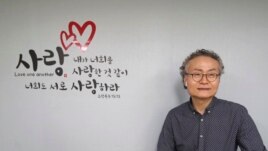 In this Nov. 1, 2019, photo, Shim Yang-sup, the principal of the Seoul-based alternative South-North Love School, speaks during an interview at his school in Seoul, South Korea.