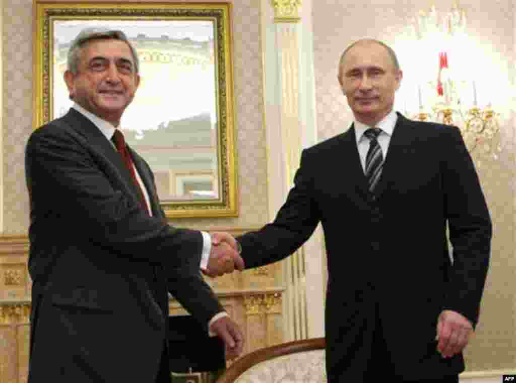 Russian Prime Minister Vladimir Putin, right, shakes hands with Armenian President Serge Sarkisian during their meeting in Moscow, Russia, Wednesday, Nov. 17, 2010.(AP Photo/RIA Novosti, Alexei Nikolsky, Pool)