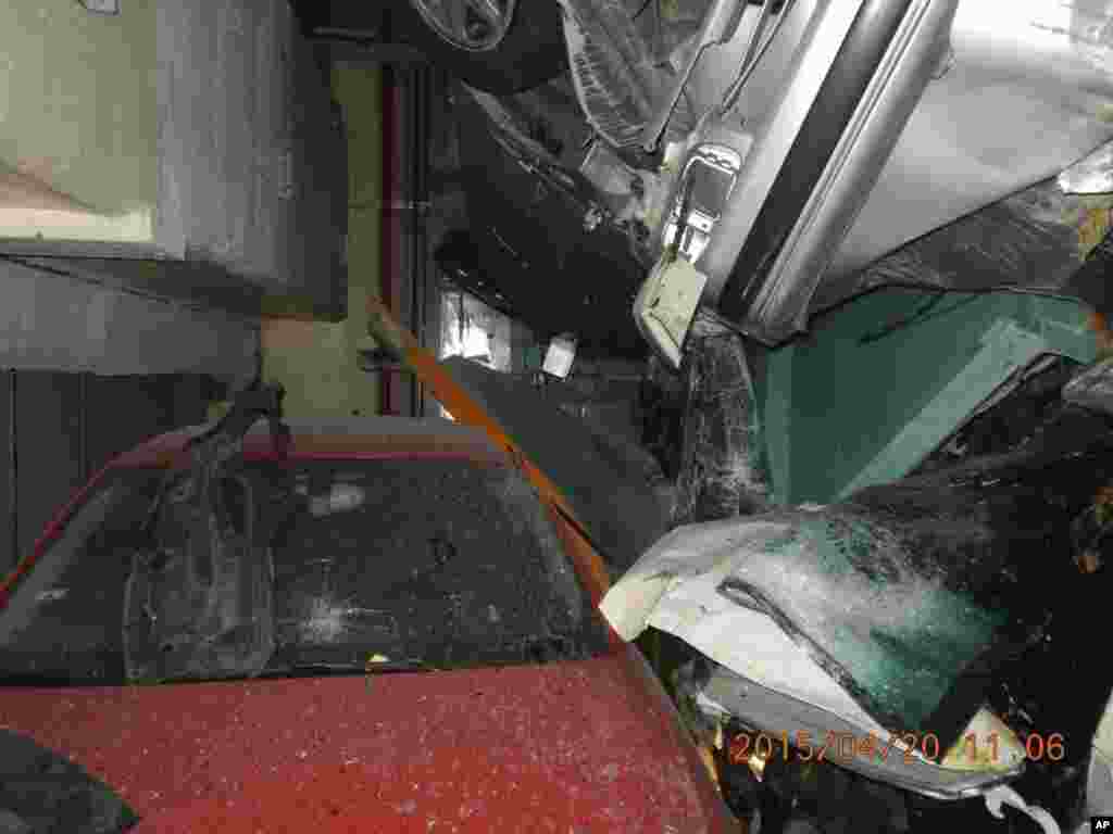 In a photo provided by the Taipei Fire Department, vehicles are seen piled up on each other in an automated parking tower after the lift system failed during the 6.3 magnitude earthquake that struck off Taiwan's eastern coast.