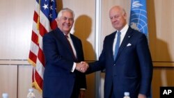 Secretary of State Rex Tillerson, left, shakes hands with U.N. Special Envoy for Syria Staffan de Mistura before their meeting on Oct. 26, 2017, in Geneva.