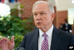 FILE - U.S. Attorney General Jeff Sessions is interviewed by The Associated Press at the U.S. Embassy in San Salvador, El Salvador, July 27, 2017.