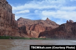 The Colorado River winds through Utah's canyon country.