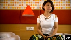 被捕的三名活動人士之一華海峰的妻子鄧桂棉