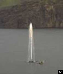 A plume of water on Lake Nyos includes combustible gases that gather along the bottom