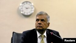 FILE - Sri Lankan Prime Minister Ranil Wickremesinghe looks on at a news conference in parliament in Colombo, Sri Lanka, April 4, 2018.