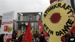 Protesters against nuclear energy demonstrate in front of the chancellery in Berlin, Germany, March 14, 2011