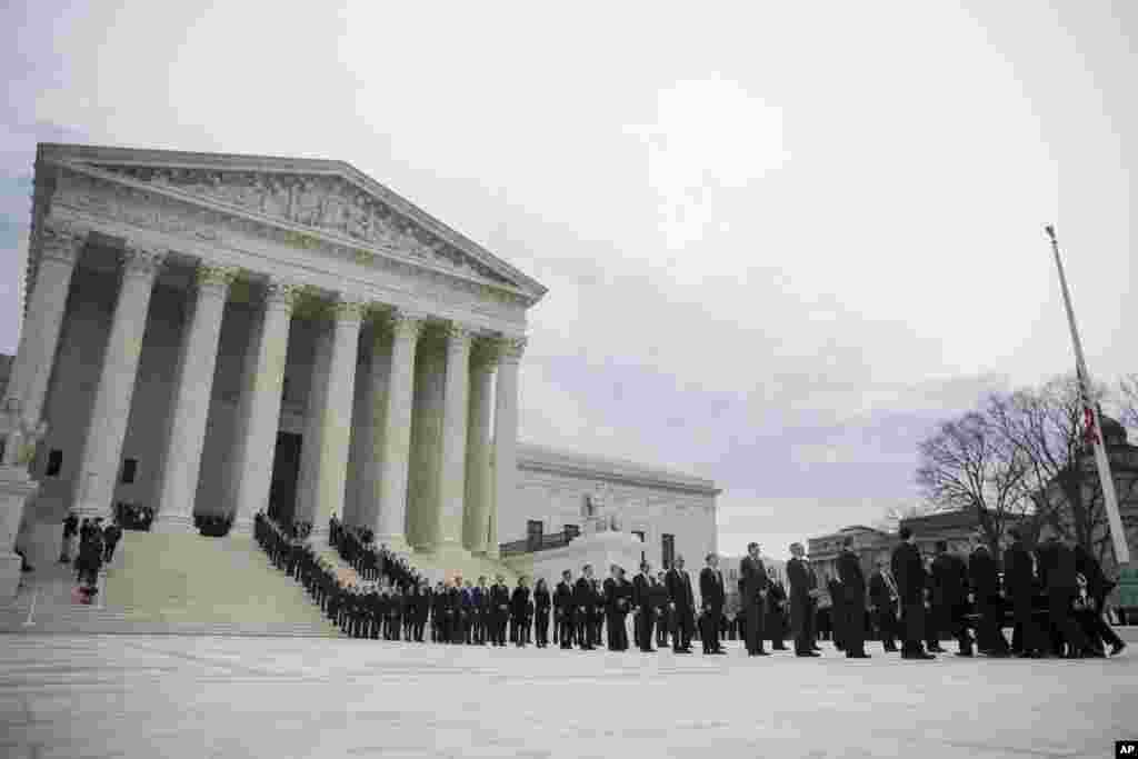 The casket of Supreme Court Justice Antonin Scalia arrives at the Supreme Court in Washington, Feb. 19, 2016. 