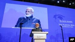 India's Prime Minister Narendra Modi delivers a keynote address at the opening dinner of the 17th IISS Shangri-la Dialogue, an annual defense and security forum in Asia, in Singapore, June 1, 2018, in Singapore. 