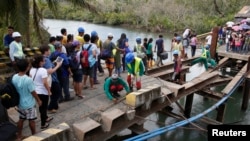 Un puente dañado luego del tifón Hagupit en el centro de Filipinas, en diciembre de 2014. Se viene una mayor migración provocada por los eventos climáticos extremos.