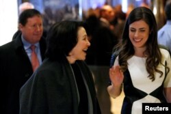 Oracle co-CEO Safra Catz, center, enters Trump Tower ahead of a meeting of technology leaders with President-elect Donald Trump in Manhattan, New York City, Dec. 14, 2016.