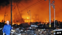 Nhà cửa cháy, đổ tan nát sau trận động đất kinh hoàng ở Iwaki, Fukushima, Nhật Bản, ngày 11 tháng 3, 2011.