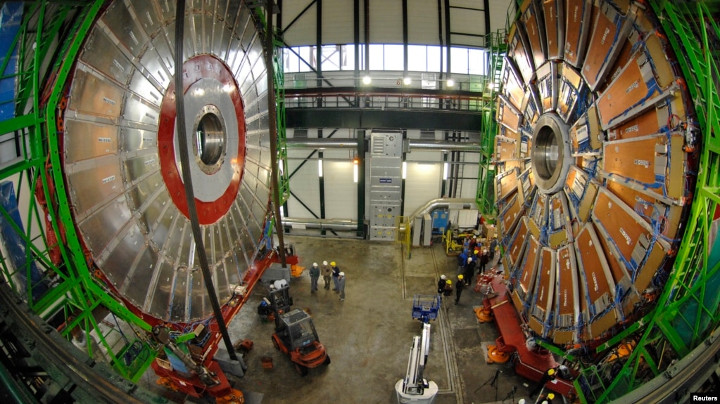 FILE - Overview of the first element (L) of the huge magnet of the CMS (Compact Muon Solenoid) experimental site at the European Organization for Nuclear Research CERN (Centre Europeen de Recherche Nucleaire) before its lowering on Thursday in the French village of Cessy in 2006.