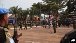 United Nations peace keeping troops take part in a ceremony in the capital city of Bangui, Central African Republic, Sept. 15, 2014.