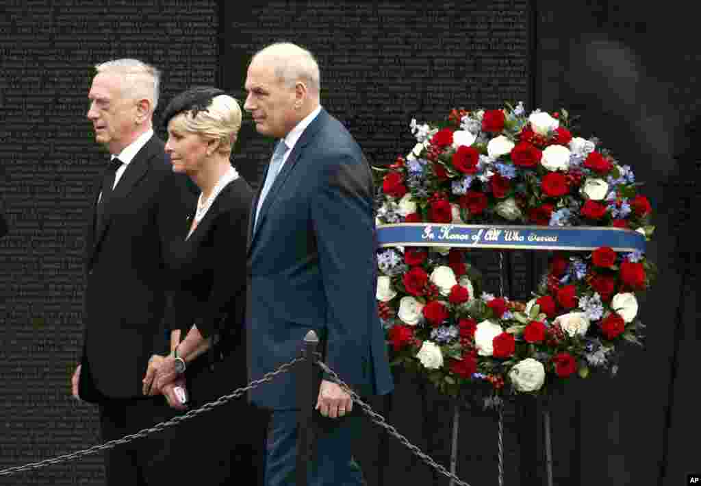 Cindy McCain, the wife of Sen. John McCain, with Defense Secretary Jim Mattis (L) and White House Chief of Staff John Kelly, depart after placing a wreath at the Vietnam Veterans Memorial, Sept. 1, 2018.