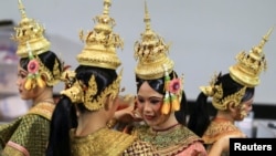 FILE - Dancers get ready backstage before a performance of masked theater known as Lakhon Khon in Cambodia. Picture taken November 7, 2018. (REUTERS/Athit Perawongmetha)