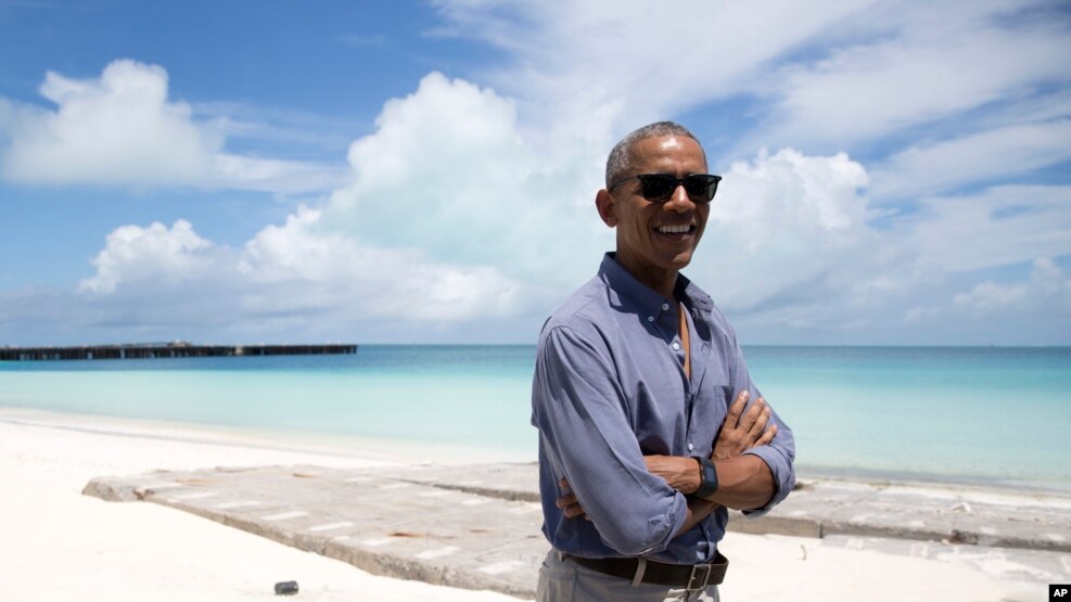 President Barack Obama looks stands at Turtle Beach to speak to the media as he tours Midway Atoll in the Papahanaumokuakea Marine National Monument, Northwestern Hawaiian Islands.