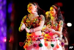 FILE - Bollywood dancers perform during a charity event hosted by the Republican Hindu Coalition in Edison, New Jersey, Oct. 15, 2016.