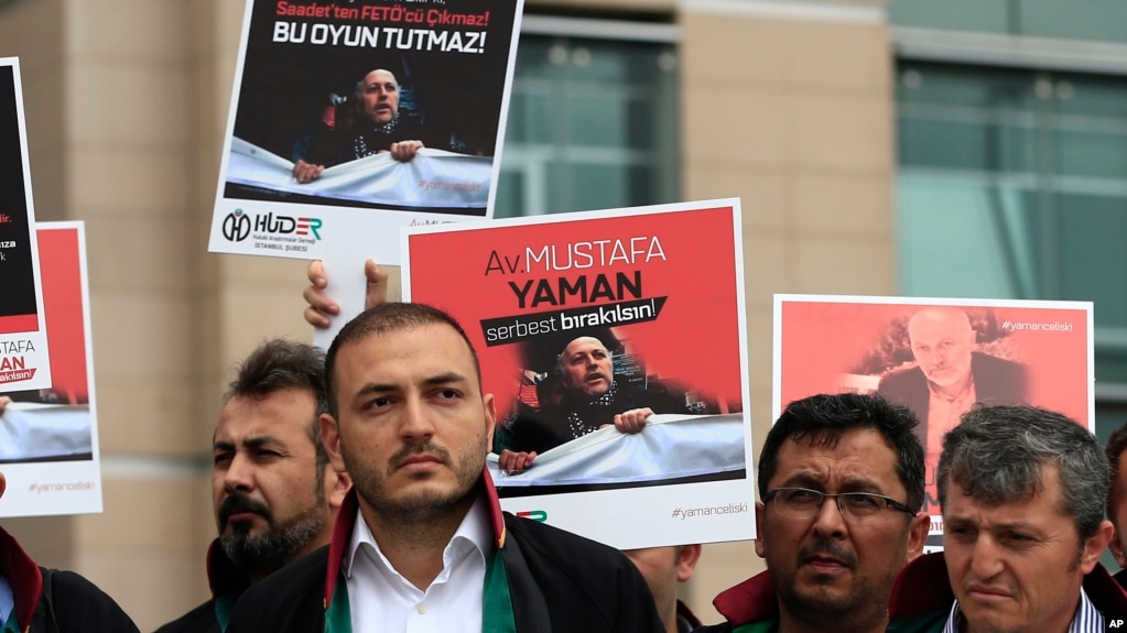 Turkish lawyers hold a protest outside Istanbul's court, July 17, 2017, demanding the release of Mustafa Yaman, a lawyer who according to Turkish media was detained earlier this month. 