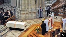 Manute Bol's casket lies at the Washington National Cathedral during funeral services for the late NBA star, 29 Jun 2010