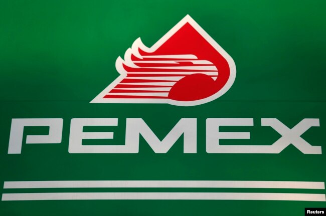FILE - The logo of Mexican state-owned oil company Pemex is seen at a Mexico City gas station.
