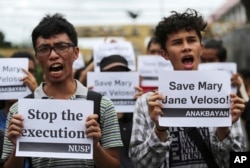 Para mahasiswa yang berunjuk rasa mendesak Presiden Filipina Rodrigo Duterte untuk menyelamatkan Mary Jane Veloso, di dekat Istana Malacanang, Manila, Filipina, 13 September 2016. (Foto: AP)