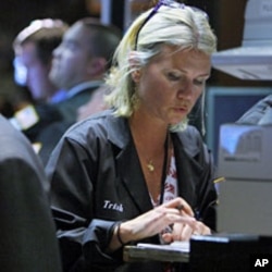 Traders work on the floor of the New York Stock Exchange (File)