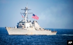 FILE - U.S. Navy destroyer USS Stethem transits waters east of the Korean Peninsula during a photo exercise including the U.S. Navy and South Korean Navy during the Operation Foal Eagle.