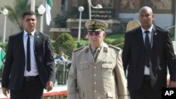 Algerian chief of staff Gen. Ahmed Gaid Salah arrives to preside over a military parade in Algiers, July 1, 2018.