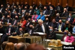 British Prime Minister Boris Johnson speaks during the weekly question time debate in Parliament in London, Dec. 15, 2021. (UK Parliament/Jessica Taylor/Handout via Reuters)