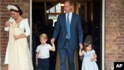 FILE - Britain's Prince William and Kate, Duchess of Cambridge with their children Prince George, Princess Charlotte Prince Louis as they arrive for Prince Louis' christening service at the Chapel Royal, St James's Palace, London, July 9, 2018.