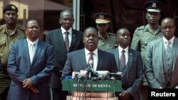 Kenya's Interior Minister Fred Matiang'i speaks during a press conference in Nairobi, Jan. 31, 2018. 