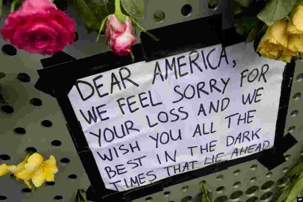 A sign is put up in reaction to the outcome of the U.S. presidential election, at the U.S. consulate in Amsterdam, Netherlands.