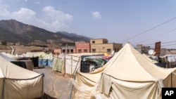 Tents set up by people who were affected by the 2023 earthquake, in the town of Amizmiz, outside Marrakech, Morocco, Sept. 4, 2024.