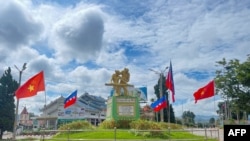 FILE - This photo taken on August 10, 2024 shows Myanmar National Democratic Alliance Army flags in Myanmar's northern Shan State. The group said December 3 it is ready for talks with the junta to end more than a year of fighting that has ravaged areas along the Chinese border.