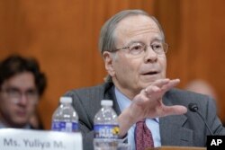 FILE - International law attorney Paul Reichler, testifies during a Commission on Security and Cooperation in Europe hearing on Ukraine on Capitol Hill, December 6, 2023, in Washington.