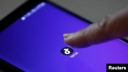 Logo aplikasi TikTok terlihat di layar ponsel. (Foto: Reuters)