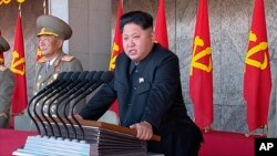 FILE - North Korean leader Kim Jong Un delivers a speech during the ceremony to mark the 70th anniversary of the country's ruling party in Pyongyang, Oct. 10, 2015. 