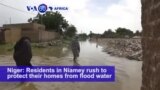 VOA60 Africa - Niger: Residents in Niamey rush to protect their homes from flood water