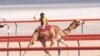 Ramesh Jaipal, who was sold into slavery as a child, is seen racing a camel in Dubai at age 6.