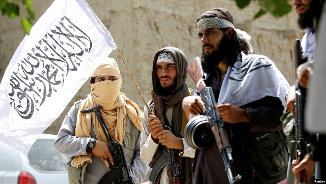 Taliban celebrate ceasefire in Ghanikhel district of Nangarhar province, Afghanistan, June 16, 2018.