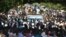 Sudanese protesters hold a sit-in outside the presidential palace in Khartoum, demanding a return to military rule, on October 21, 2021.