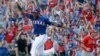 Texas Rangers' Hanser Alberto runs onto the field after the final out of the baseball game against the Los Angeles Angels in Arlington, Texas, Sunday, Oct. 4, 2015. 