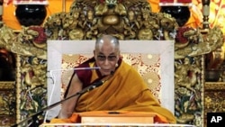 Tibet's exiled spiritual leader the Dalai Lama gives a religious talk at the Tsuglakhang temple in Dharmsala, India, March 14, 2011