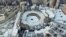 TOPSHOT - An aerial view shows the Grand Mosque, deserted on the first day of the Muslim fasting month of Ramadan, in the Saudi holy city of Mecca, on April 24, 2020, during the novel coronavirus pandemic crisis.