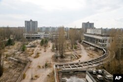 A central square in the deserted town of Pripyat, some 3 kilometers (1.86 miles) from the Chernobyl nuclear power plant Ukraine.