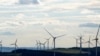 FILE - A wind farm behind Voigtsdorf near Dorfchemnitz, Germany, is seen in this Aug. 9, 2024, photo. 