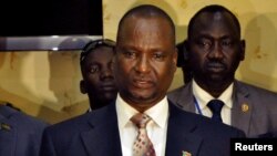 FILE - Taban Deng Gai, then-chief negotiator of the rebel group known as SPLA-IO, addresses a news conference after arriving in South Sudan's capital Juba.