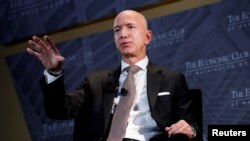 FILE - Jeff Bezos, president and CEO of Amazon, speaks at an event in Washington, Sept. 13, 2018.